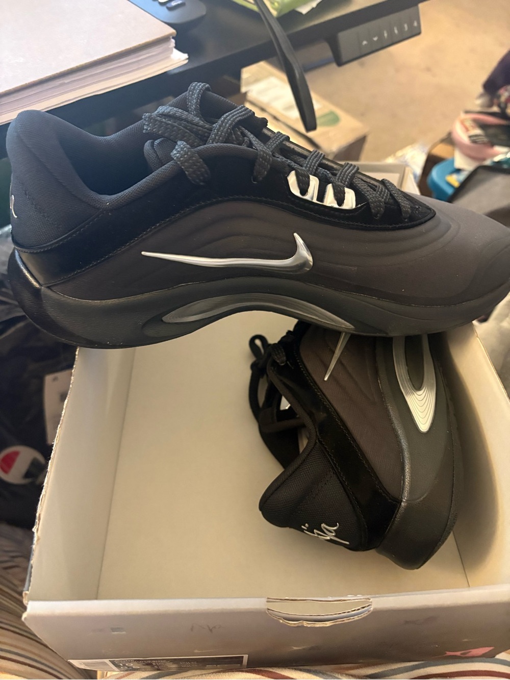 Nike Men’s Black Sneakers with Silver Swoosh